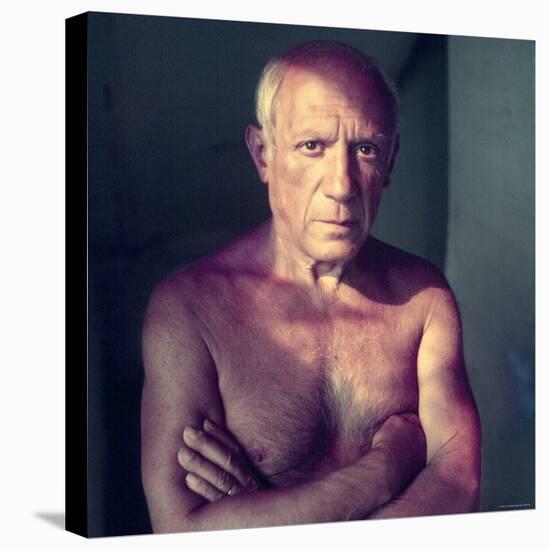 Portrait of Artist Pablo Picasso, Arms Folded Across Bare Chest, at His Home, Alone-Gjon Mili-Premier Image Canvas