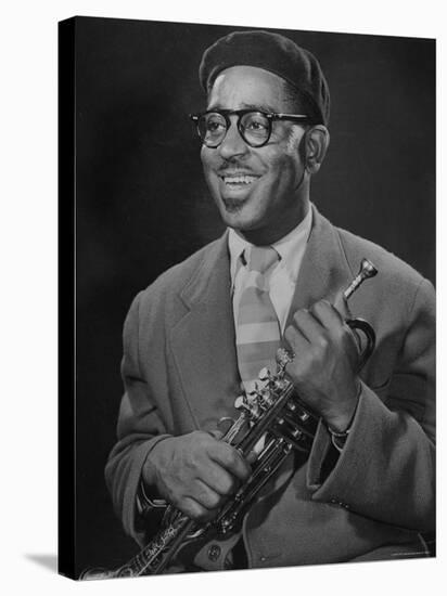 Portrait of Dizzy Gillespie, "Bebop" King, Holding His Trumpet-Allan Grant-Premier Image Canvas