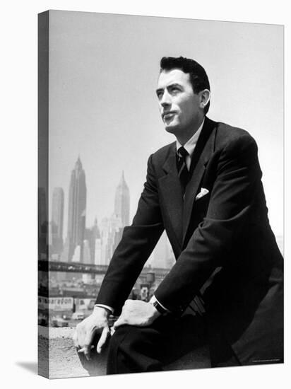 Portrait of Gregory Peck, Serious, Smoking a Cigarette-Nina Leen-Premier Image Canvas