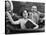 Portrait of Happy Couple Waving in Car-null-Stretched Canvas