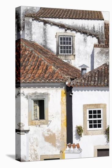 Portugal, Obidos. Ancient, red, terra cotta tiled roof tops, lines.-Emily Wilson-Premier Image Canvas