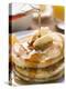 Pouring Maple Syrup over Pancakes with Dab of Butter-null-Premier Image Canvas