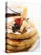 Pouring Maple Syrup over Waffles with Butter and Berries-null-Premier Image Canvas