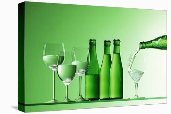 Pouring Mineral Water into Glass-Klaus Arras-Premier Image Canvas