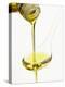Pouring Olive Oil Over a Spoon-Marc O^ Finley-Premier Image Canvas