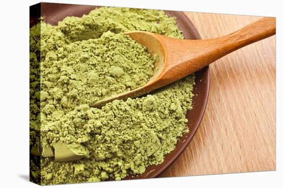 Powdered Green Tea Matcha in Spoon on Wood Table Surface close Up-Madlen-Premier Image Canvas