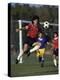 Powerful Leaping Soccer Player-null-Premier Image Canvas
