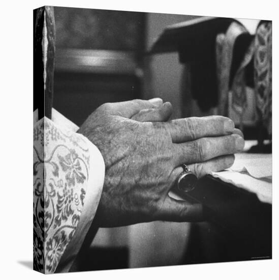 Praying Hands of Monk Churchman Resting on Table During Mass at St. Benedict's Abbey-Gordon Parks-Premier Image Canvas