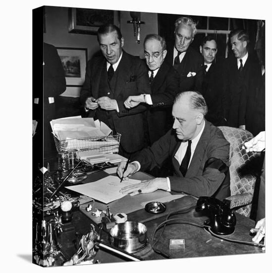 Pres. Franklin D. Roosevelt Signing Declaration of War Following Japanese Bombing of Pearl Harbor-Thomas D^ Mcavoy-Premier Image Canvas