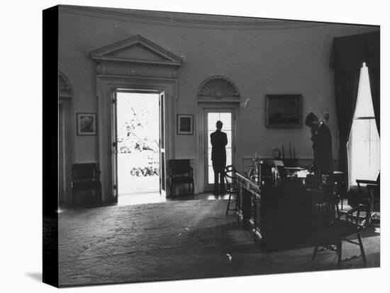 Pres. John F. Kennedy and Attorney Gen. Robert F. Kennedy Conferring in the Oval Office-null-Premier Image Canvas