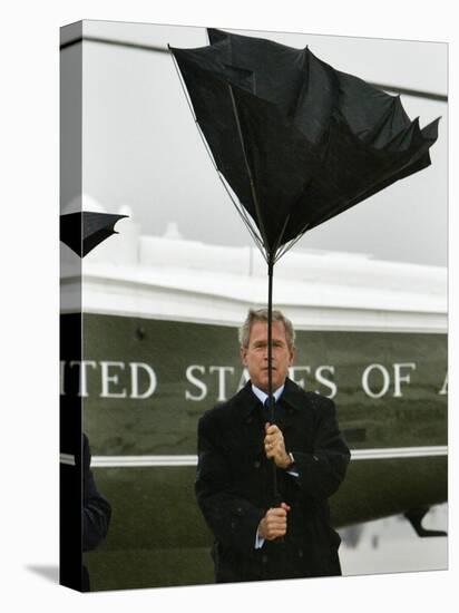 President Bush Jokingly Holds His Wind-Blown Umbrella Upright-null-Premier Image Canvas