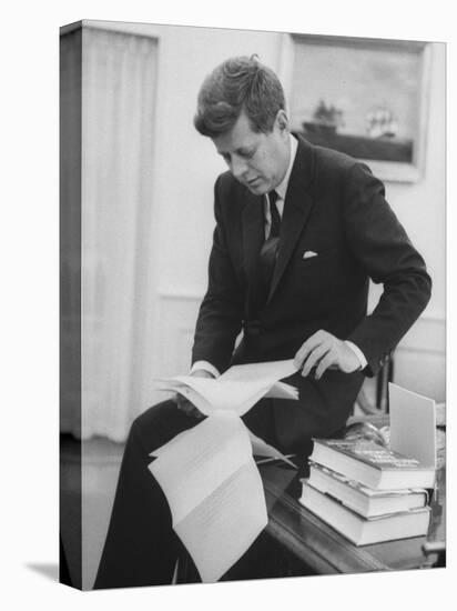 President John F. Kennedy Working in the White House Office-null-Premier Image Canvas