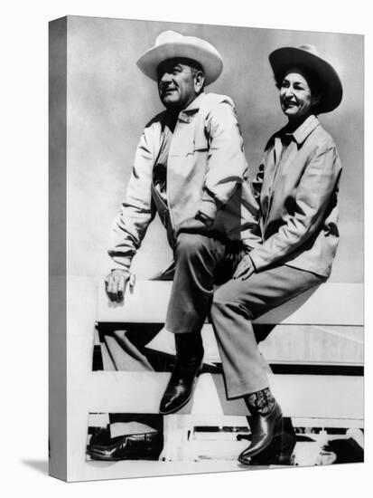 President Lyndon and Lady Bird Johnson Sitting on a Fence at the LBJ Ranch-null-Stretched Canvas