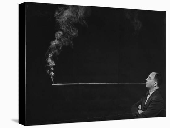 President of Zeus Corp., Robert Stern, Smoking from Self-Designed Four Foot Long Cigarette Holder-Yale Joel-Premier Image Canvas