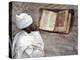 Priest of Ethiopian Orthodox Church Reads Old Bible at Rock-Hewn Church of Yohannes Maequddi-Nigel Pavitt-Premier Image Canvas