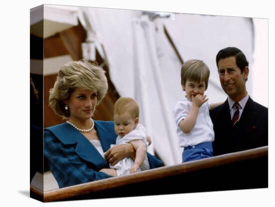 Prince Charles stands holding sons Prince William and Prince Harry with Princess Diana, Circa 1985-null-Premier Image Canvas