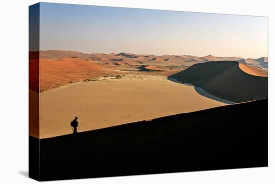 Profile of a Hiker on the Sand Dune Shaped by the Wind, Sossusvlei, Namib Naukluft National Park-Roberto Moiola-Premier Image Canvas