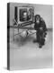 Puzzled Orangutan Standing Next to TV Set Playing the Image of President Richard Nixon-Yale Joel-Premier Image Canvas