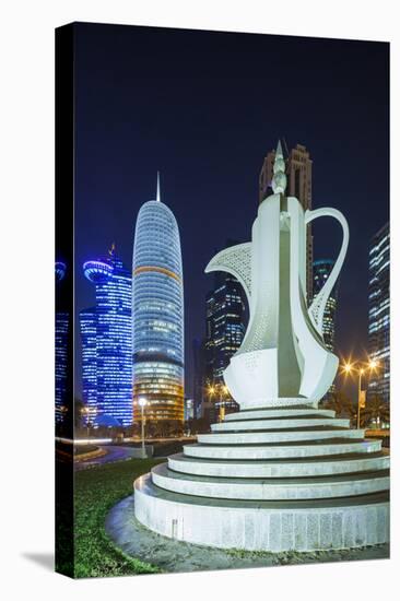 Qatar, Doha, Doha Bay, West Bay Skyscrapers, Dusk, with Large Coffeepot Sculpture-Walter Bibikow-Premier Image Canvas