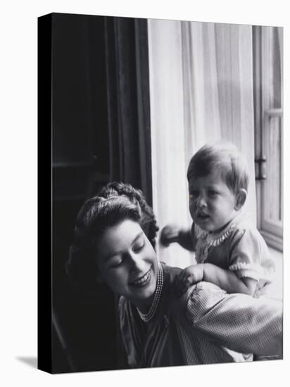 Queen Elizabeth and Prince Charles at Buckingham Palace, London, England-Cecil Beaton-Premier Image Canvas