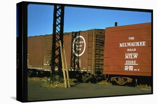 Railroad Box Cars with the Logos of the Atlantic Coast Line and Milwaukee Road Railroads-Walker Evans-Premier Image Canvas