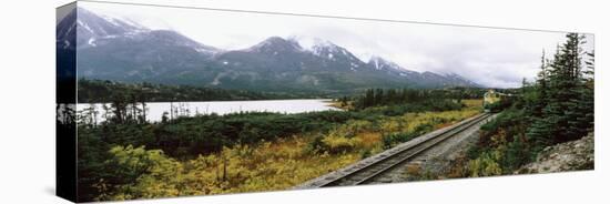 Railroad Track Passing through a Landscape, Yukon Railroad, Summit Lake, White Pass, Alaska, USA-null-Premier Image Canvas