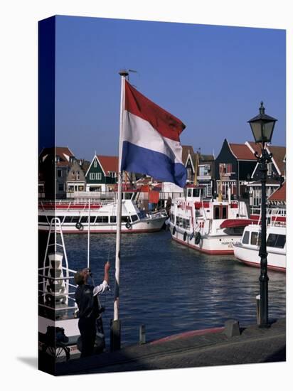 Raising the Dutch Flag by the Harbour, Volendam, Ijsselmeer, Holland-I Vanderharst-Premier Image Canvas