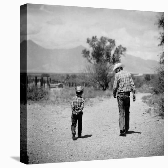 Rancher James A. Shugart Walking a Dusty Road with Son James Jr-Allan Grant-Premier Image Canvas