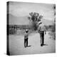 Rancher James A. Shugart Walking a Dusty Road with Son James Jr-Allan Grant-Premier Image Canvas