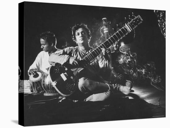 Ravi Shankar Passionately Playing the Sitar-Paul Schutzer-Premier Image Canvas