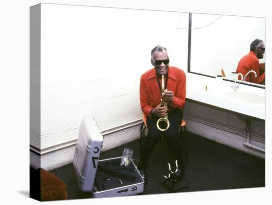 Ray Charles with His Alto Saxophone Backstage-null-Stretched Canvas