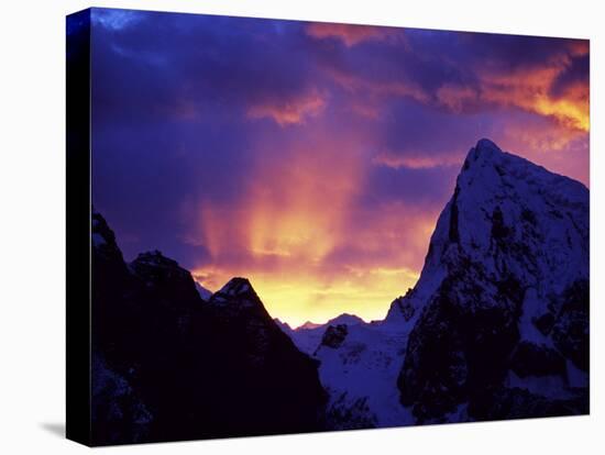Rays of Sunlight Illuminate the Clouds over the Mountains to the West of Gokyo at Sunrise-Mark Hannaford-Premier Image Canvas