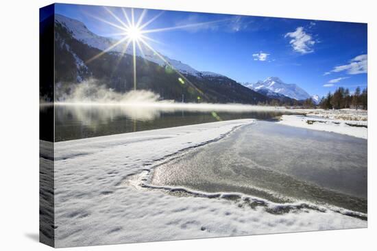 Rays of Winter Sun Illuminate Lake Silvaplana Still Partially Frozen, Switzerland-Roberto Moiola-Premier Image Canvas