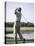 Rear View of a Senior Man Swinging a Golf Club-null-Premier Image Canvas