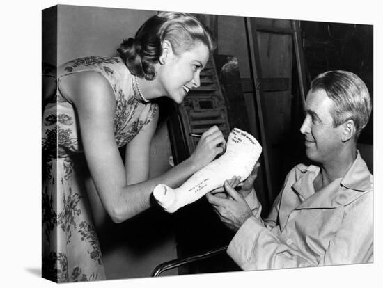 REAR WINDOW, 1954 directed byALFRED HITCHCOCK On the set, Grace Kelly and James Stewart (b/w photo)-null-Stretched Canvas