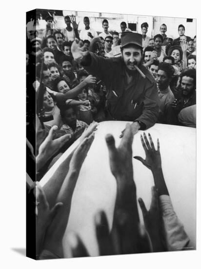 Rebel Leader Fidel Castro Being Cheered by a Village Crowd on His Victorious March to Havana-Grey Villet-Premier Image Canvas