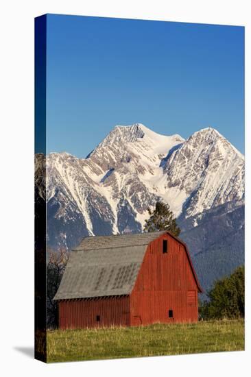 Red Barn Sits Below Mcdonald Peak in the Mission Valley, Montana, Usa-Chuck Haney-Premier Image Canvas