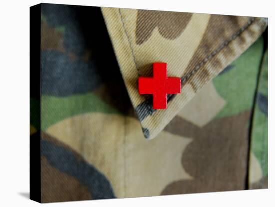 Red Cross on the Collar of a Camouflage Jacket-Winfred Evers-Premier Image Canvas