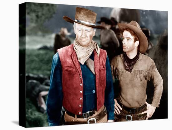 RED RIVER, from left: John Wayne, Montgomery Clift, 1948-null-Stretched Canvas