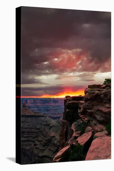 Red sunset with moody clouds and red rock canyons in Dead Horse Point State Park near Moab, Utah-David Chang-Premier Image Canvas