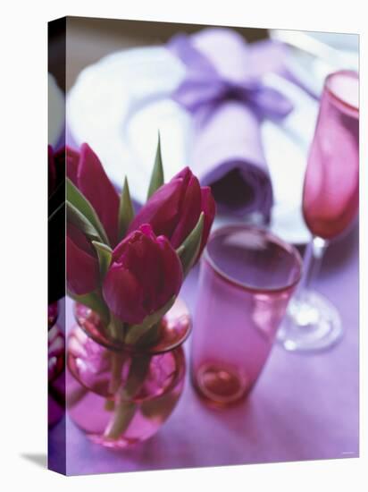 Red Tulips in Small Vase Beside Place Setting-Michael Paul-Premier Image Canvas