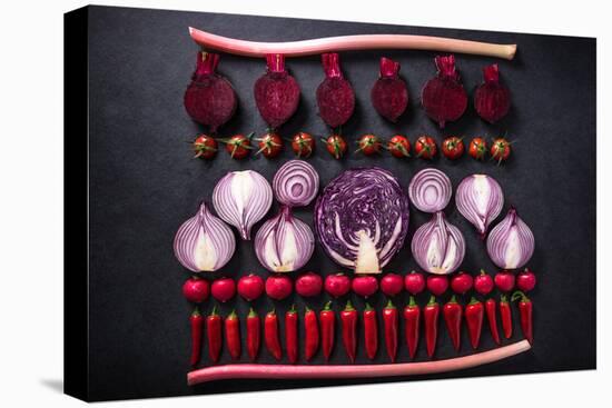 Red Vegetables Cut in Halves, Flat Lay Design on Dark Background, Symmetric-Marcin Jucha-Premier Image Canvas