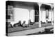 Relaxed Dogs Lounge on a Farmhouse Porch, Ca. 1905-null-Premier Image Canvas