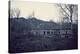 Remains of a bunker with door and windows at a mountain in a wood in winter in Alsace-Axel Killian-Stretched Canvas