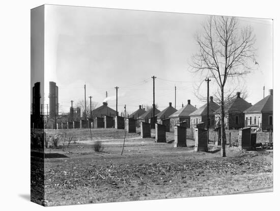 Republic Steel Company workers' houses and outhouses in Birmingham, Alabama, 1936-Walker Evans-Premier Image Canvas