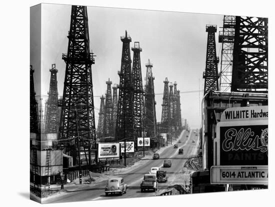 Ribbon of Highway Passing the Signal Hill Oil Field Near Long Beach-Andreas Feininger-Premier Image Canvas