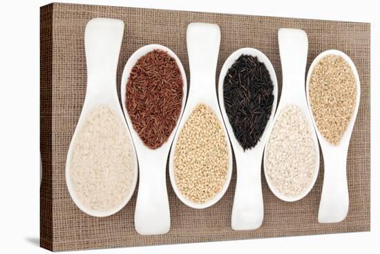 Rice Grain Selection In White Porcelain Scoops Over Hessian Background-marilyna-Stretched Canvas