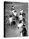 Riders Enjoying Motorcycle Racing, Leaving a Trail of Dust Behind-Loomis Dean-Premier Image Canvas