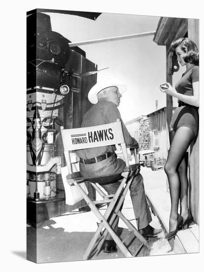 RIO BRAVO, 1959 directed by HOWARD HAWKS On the set, Hohard Hawks directs Angie Dickinson (b/w phot-null-Stretched Canvas