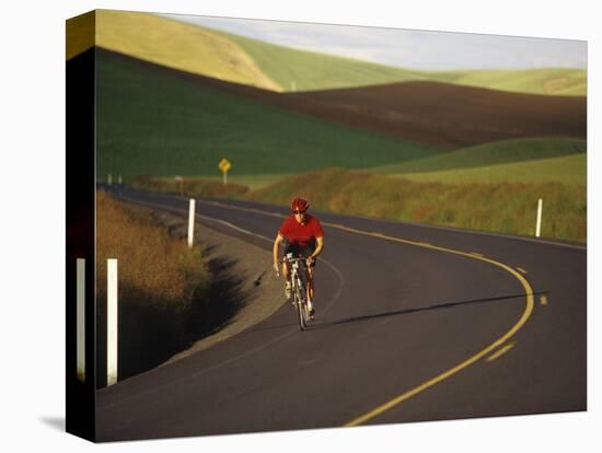 Road Bicycling in the Palouse Country Near Pullman, Washington, USA-Chuck Haney-Premier Image Canvas